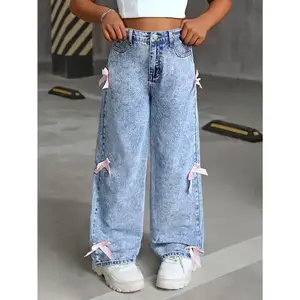 New fashionable wide-leg jeans with bow decoration. Cute Women’s Light Blue Loose Denim Baggy Streetwear Pants