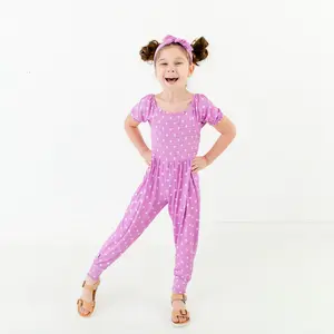 Prehistoric Purple Polka Dot Smocked Romper