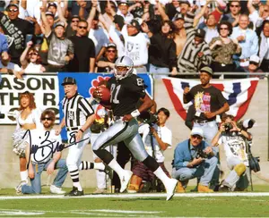 Tim Brown Las Vegas Raiders Autographed 8'' x 10'' Running Stands Behind Photograph - Fanatics Authentic Certified
