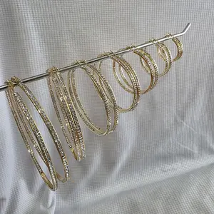 hoops zirconia on both size of hoop gold plated ,Aracadas de zirconia en ambos lados de la arcada en tono oro o oro blanco