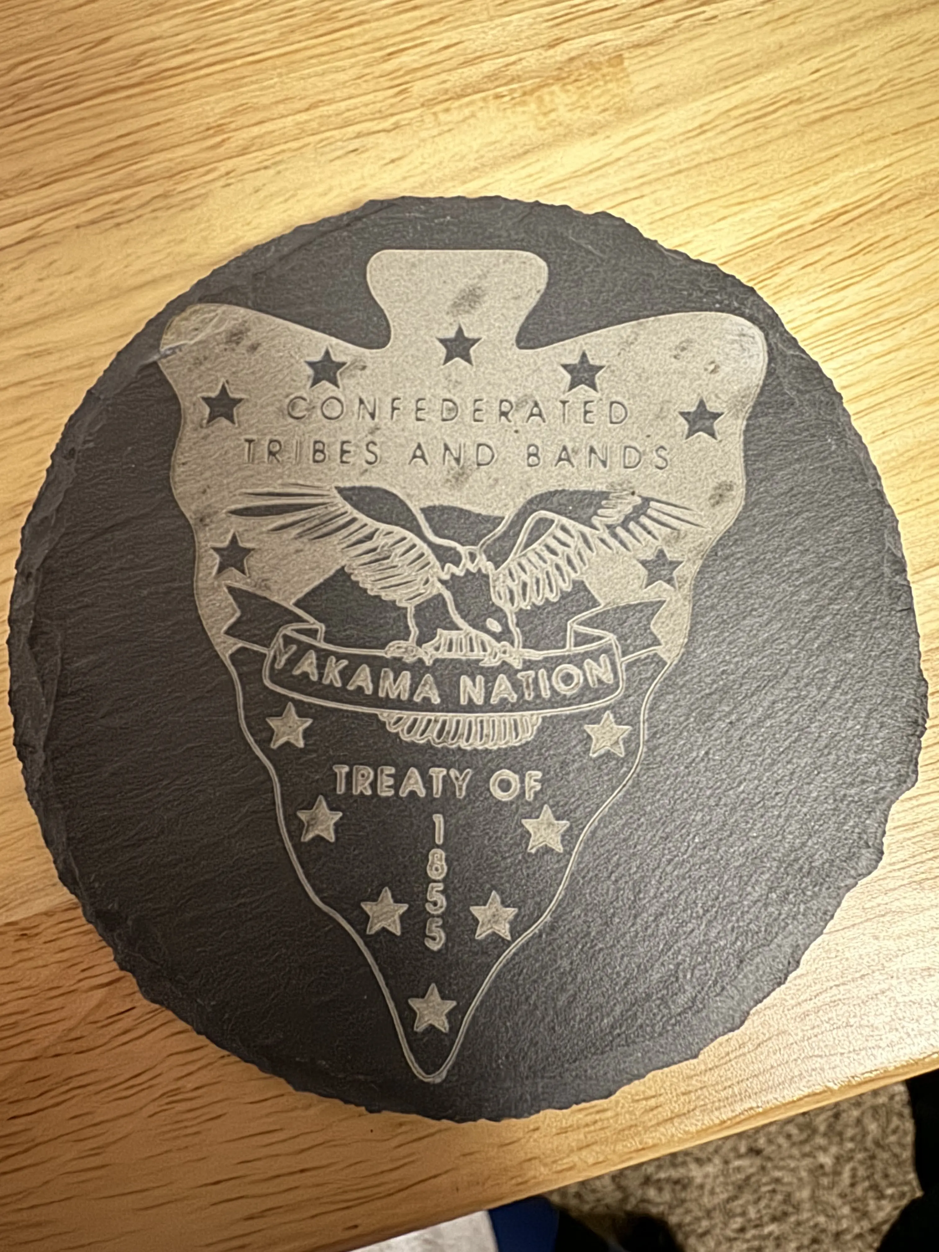 Slate coasters with logo on them