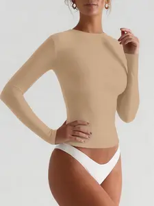 A women's nude long-sleeve fitted base top, characterized by its lightweight and body-hugging fit, is suitable as an everyday layering piece, a work commute layering item, or a basic top for casual occasions, Womenswear