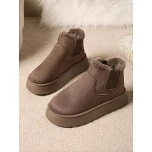 Women’s fleece-lined Chelsea snow boots, available in multiple colors, featuring a warm plush cuff; comfortable, fashionable winter footwear.