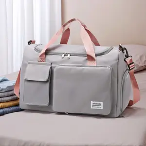 Spacious Portable Duffel Bag for Women, Large Capacity Travel Tote with Multiple Pockets, Durable Gym and Beach Carryall Featuring Water-Resistant Fabric, Perfect for Daily Commute and Weekend Trips