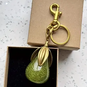 Golden Pear-Shaped Keychain with Green Glitter Acrylic Charm  Cute Fruit Design Bag Accessory for Women and Girls, Fun Gift Idea