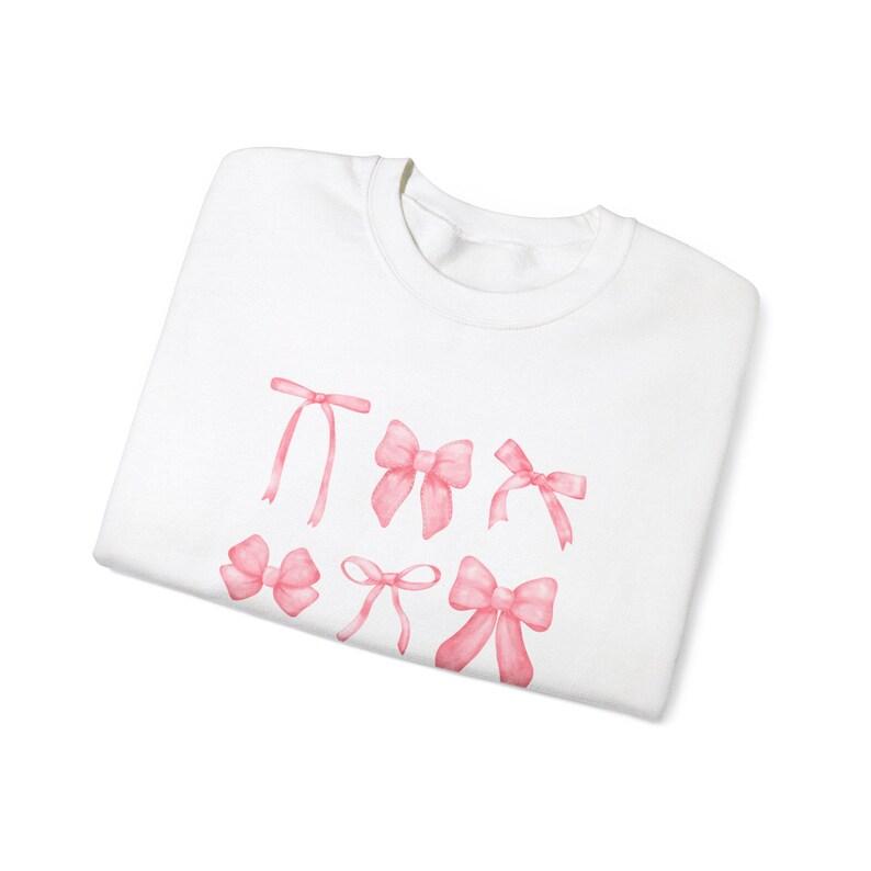 Unisex White Fashion Sweater – Cute Pink Bow Print Design, Soft and Comfortable Fabric, Easy to Style, Perfect for Casual Outings, School, and Streetwear gilmore  girls  merch