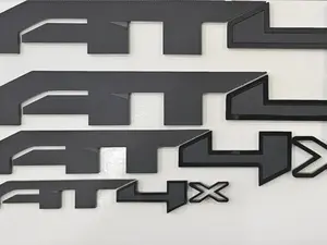 GMC "AT4X HD" Emblem Set