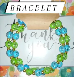 Handmade Memory Wire Bracelet with Beautiful Beads & Charms - Perfect for Everyday Wear or Special Occasions - Unique & Stylish Accessory with Green Accents