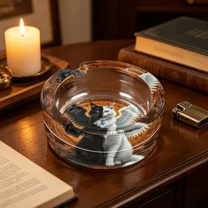 1 round glass ashtray with anti slip bottom pad, decorated with a fantasy style black and white winged cat pattern, suitable for homes, offices, and terraces. It is a fashionable ashtray for cat lovers and decoration enthusiasts