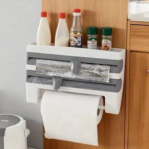 Wall-mounted kitchen organizer with built in scissors and aluminum foil dispenser. Made of durable plastic material, it is sturdy and long-lasting. It is compatible with oil paper, tin foil, baking paper, towels, and rolling paper