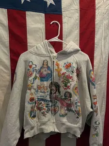 Retro fashion printed hoodie—Y2K street style that showcases a vibrant “Saint Heart and Jesus” print—simply perfect and flawless! Personalized sweatshirt, loose and stylish