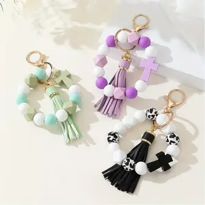 Creative and popular cross-shaped silicone bead keychain with PU tassel bracelet-style key accessory, cross-border bag pendant Earrings Long Heart Black