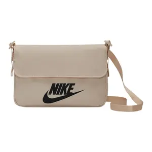 Nike Adjustable Strap Messenger Bag with Large Logo Print in Khaki for Women