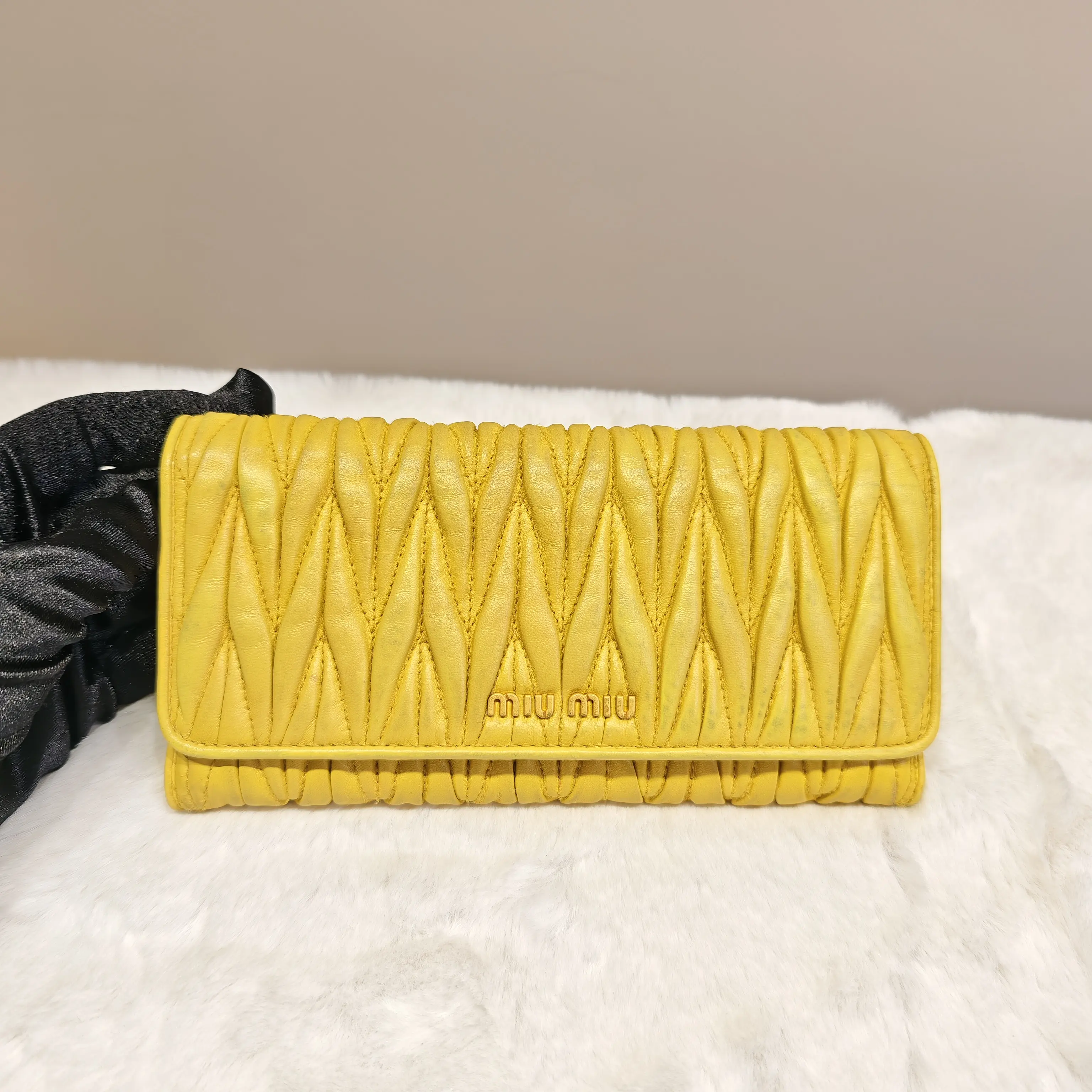 Pre-owned miu miu ruched yellow wallet