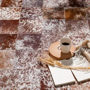 Brown and White Speckled Cowhide Patchwork Rug