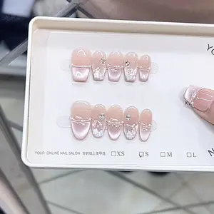 Handmade Depression-Cat Eye Long False Press On Nails - Beauty Nail Art Decoration with Elegant Rhinestone Design, Soft Pink Finish, White Pearlescent Shimmer, Included Box