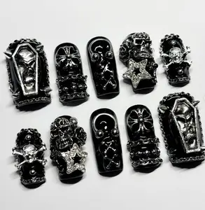 Gothic Black Coffin Nails with 3D Skulls, Chains, Spikes & Glitter Stars – Dark Halloween Nail Art Design for an Edgy Spooky Vibe
