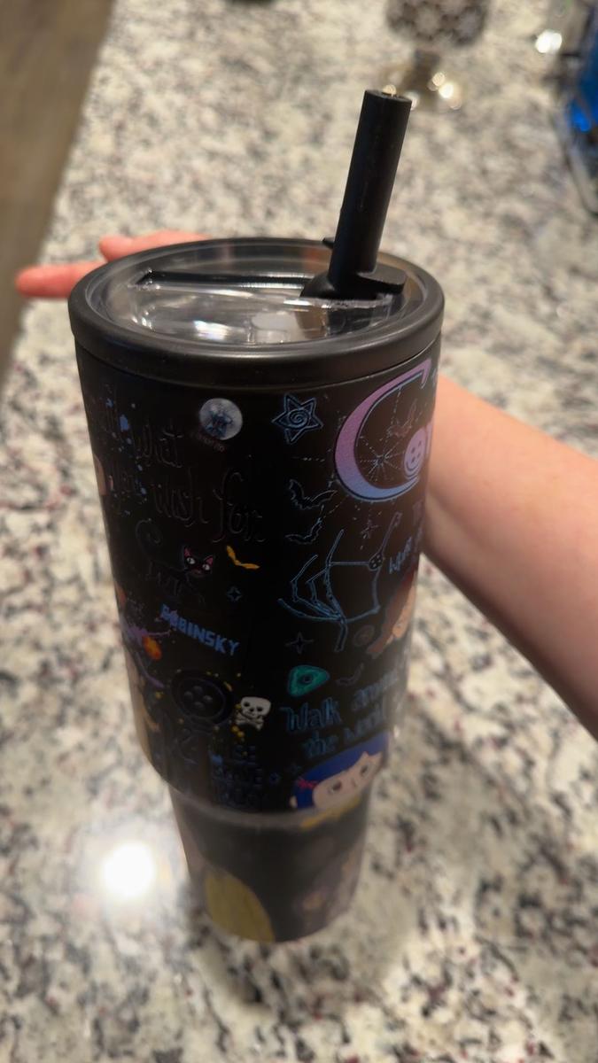 Item: Black - Buttonhole Girl, 40oz