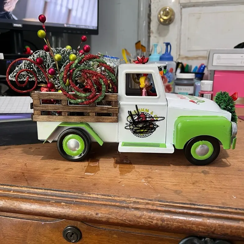 Green Man Christmas Truck with Festive Decorations and Holiday Ornaments for Seasonal Display