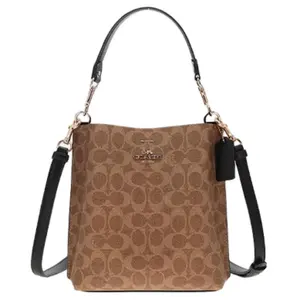 COACH Mollie 21 Classic Monogram Bucket Bag in Brown for Women