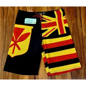 Wailoa “Red/Yellow Kanaka Symbol” Board Shorts