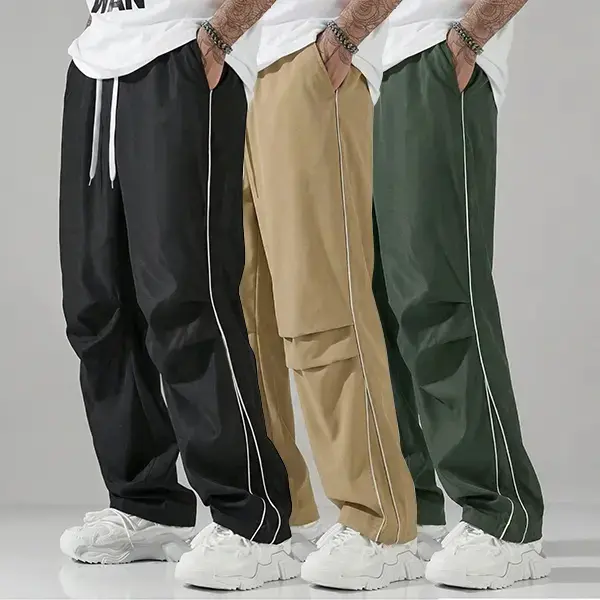 Men’s casual pants with a drawstring waist and pockets; black sweatpants; men’s black athletic pants; men’s black pants; men’s wide-leg pants with black stripes; autumn