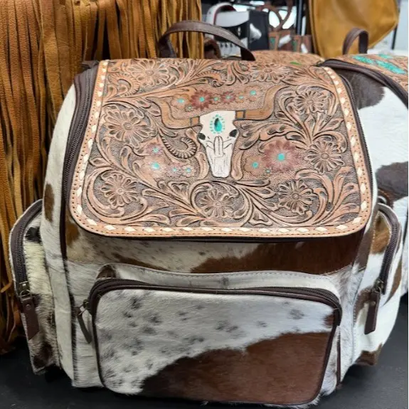 Tooled leather & longhorn and cowhide 