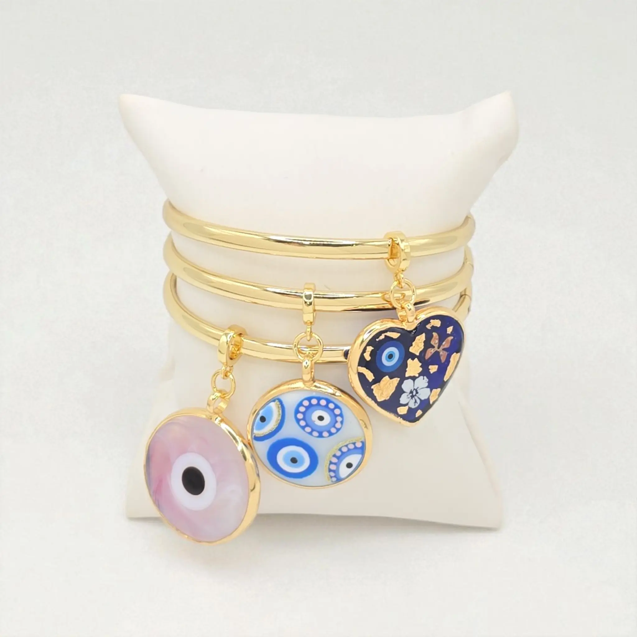Women's Gold-Tone Bangle with Evil Eye & Heart Charms 7 Inch Everyday Accessory Bracelet for Stylish Looks Elegant Design Versatile Accessory