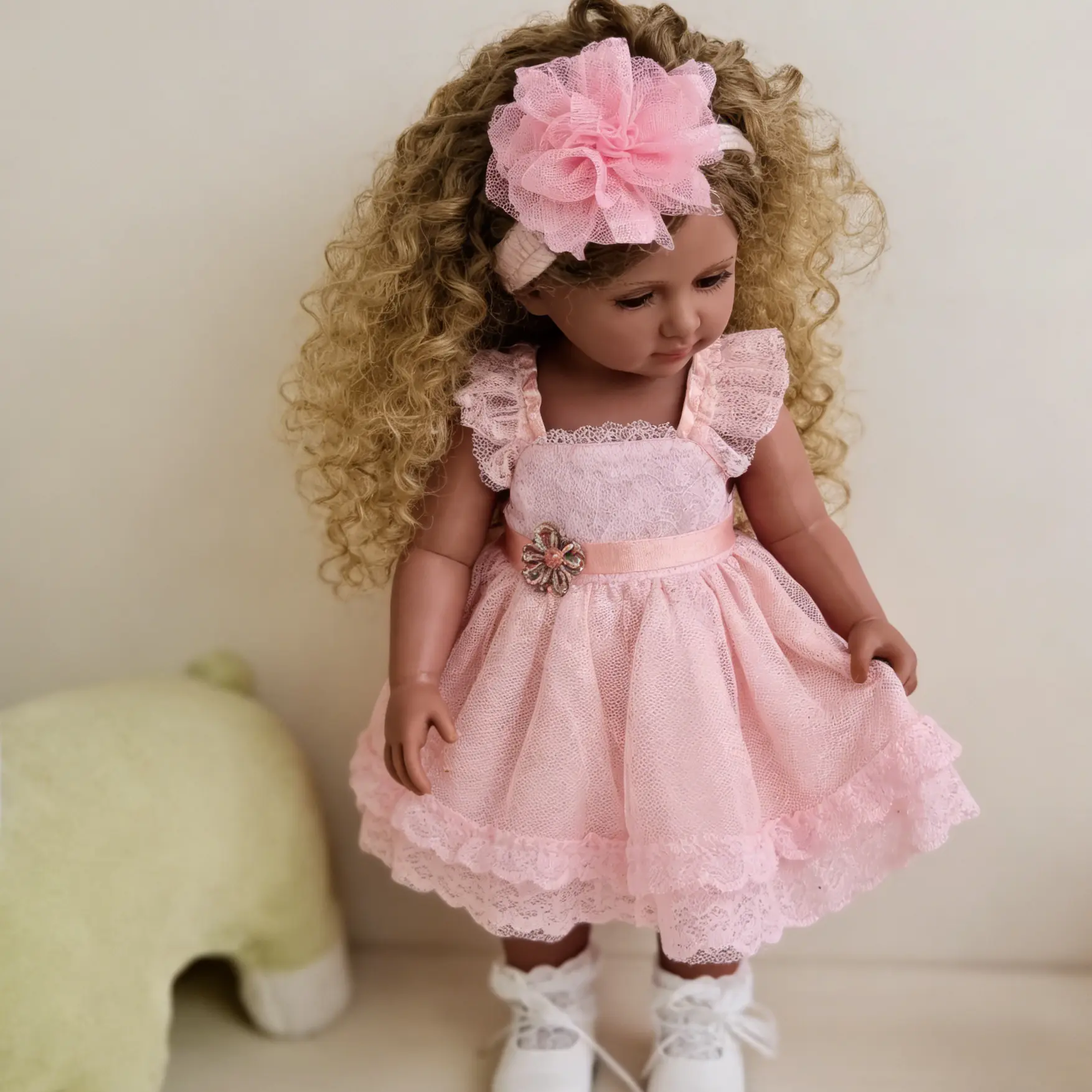 22-Inch Reborn Baby Doll Lifelike Dark Brown Skin Silicone Newborn with Curly Hair Pink Clothes Durable Kids Toy Christmas Gift