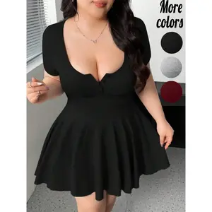 Plus-size black short-sleeve U-neck flared mini dress, casual style, feminine, made from stretchy slim fabric with a button-front detail, suitable for curvy women, perfect for date nights, brunch, and parties, TikTok viral fashion GARMENTARY