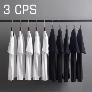 3-pack black and white 100% cotton men’s short-sleeve T-shirts; loose fit, premium feel, solid color minimalist basic tee; 180 g/m² cotton fabric, set-in shoulders, crew neck basic model men’s T-shirt; simple basic men’s T-shirt.