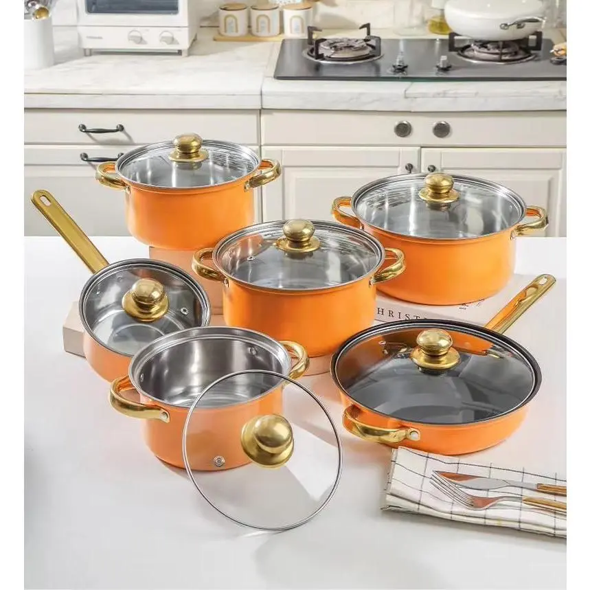 Orange Cookware Set with Gold Handles and Clear Lids for Modern Kitchen Use