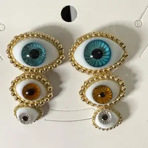 Aretes triples (ojo turco cristal)