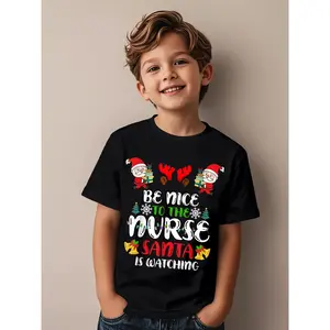 Festive Christmas Graphic T-Shirt for Kids Featuring Santa Claus and Reindeer Antlers with BE NICE to THE NURSE Text and Snowflakes and Golden Bells Design