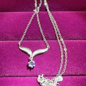 <PingEast jewelry > 925 Sterling Silver Inlaid with 4mm Natural Tanzanite Wing Pendant Necklace