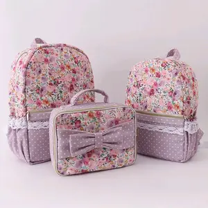 Purple floral bow ruffle back pack