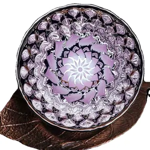 Handcrafted Jianchan teacup featuring a pink sunflower design, suitable for collecting and enjoying tea.