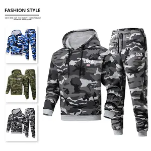 Trendy camouflage hoodie set, street fashion style, featuring a unique camouflage pattern paired with letter prints and drawstring cuffs. Perfect for stylish men out on the town or posing for photos. Autumn and winter outfit.