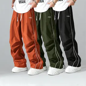 Men’s 3-pack double-line spliced wide-leg parachute pants, made from skin-friendly, breathable, comfortable fabric, suitable for casual outings, everyday dates, and commuting.