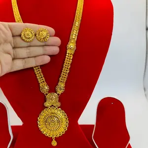 Gold plated long Rani haar with earrings.