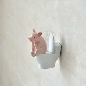 Cute Pig Sitting on Toilet PVC Bathroom Statue Table Decoration or Wall Mount Father's Day Gift for Home and Office Religious Ornaments