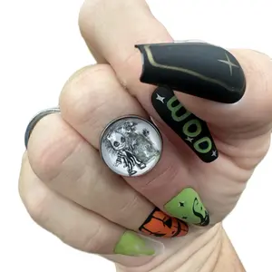 Handmade adjustable stainless steel cabochon rings featuring Beetlejuice!