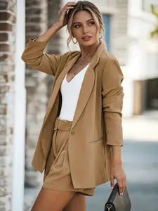 A khaki women's suit set, with the jacket featuring a notch lapel, Long Sleeve, and single-breasted regular fit, fitted. It has a simple, Minimalist, commuter-friendly, elegant, chic style, suitable for everyday casual outings and streetwear.