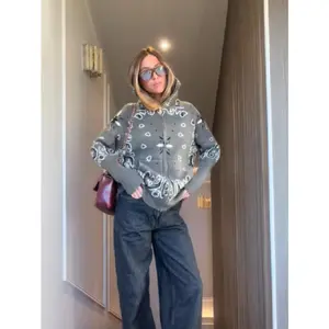 2026 new women's zipper design long-sleeved cardigan sweater loose style