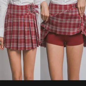 Jenny12-Pleated Plaid Mini Skort W/buckle Detail 89%Polyester 10%Rayon 1%Spandex