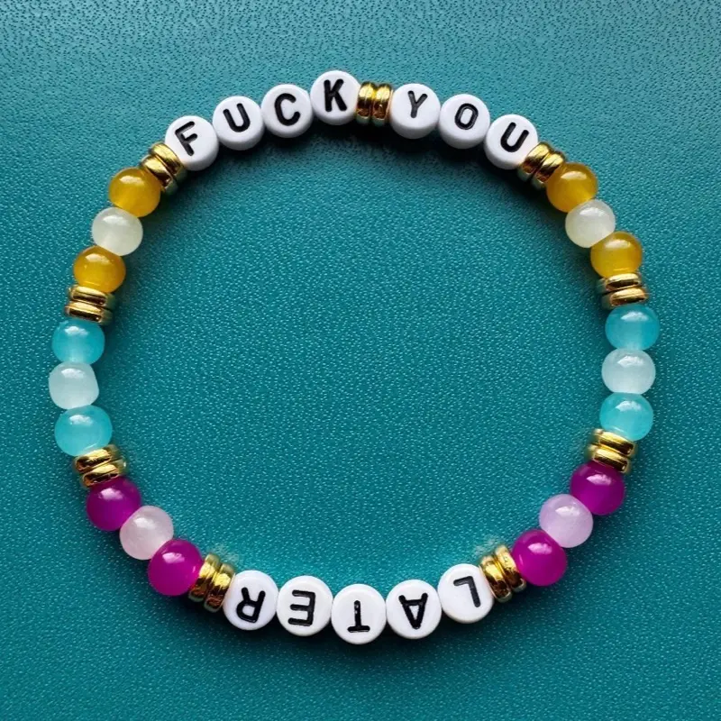 Fuck you; later. Beaded friendship bracelet.