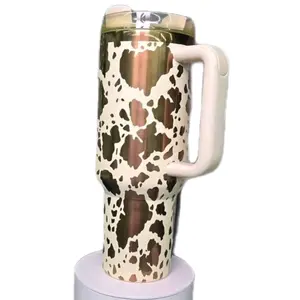 Cow Print 40oz Tumbler Stainless Steel Double-Wall Insulation Leak-Proof lid Handle Trendy Cow-Print Pattern Perfect for Iced Coffee & Everyday Adventures