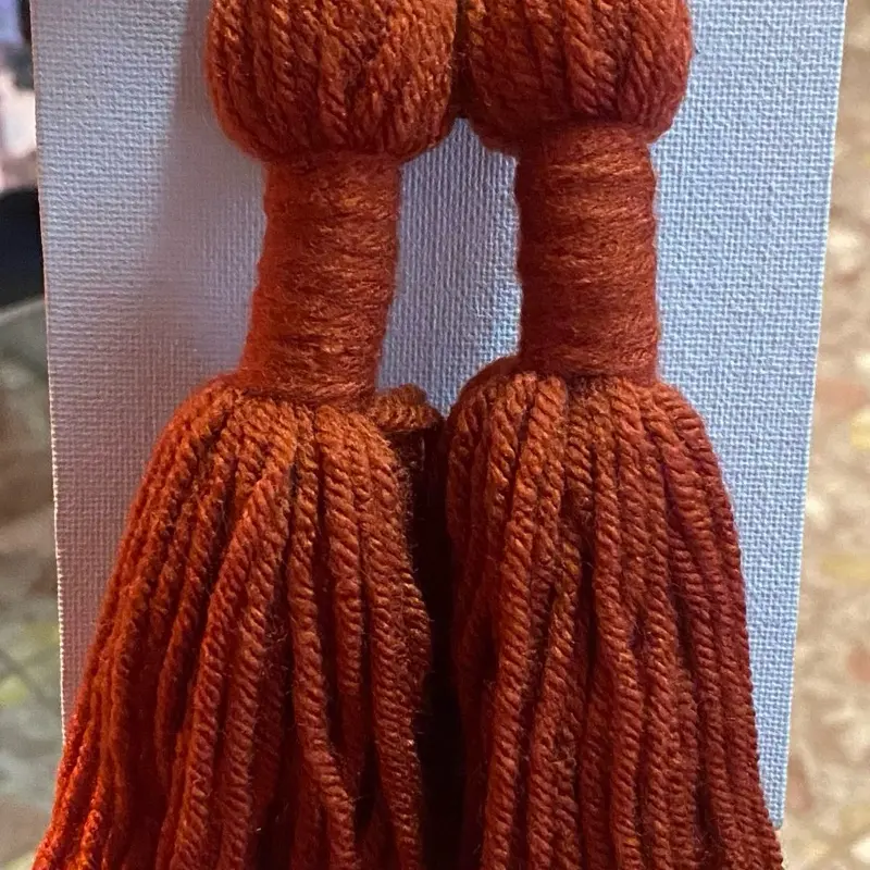 Long Tassel - Details Unknown from the Provided Information