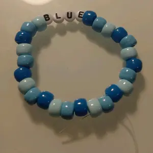 Blue Bracelet with Beads and "BLUE" Lettering, Adjustable Fit, Casual Style, Perfect for Everyday Wear