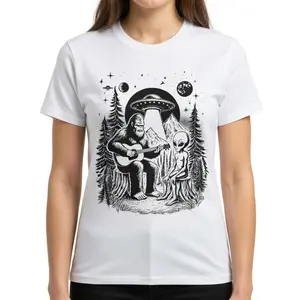Retro Bigfoot Playing Guitar with Alien and UFO T-Shirt Unisex Funny Cryptid Sci-Fi Graphic Tee Vintage Washed Distressed Short Sleeve Apparel Aesthetic 90s Style Humor Gift Fashion Top Viral Trendy Streetwear Shirt